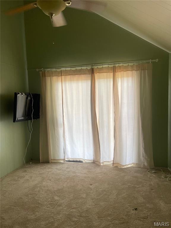252 Trails End Way, Doniphan, MO 63935 - spare room featuring carpet flooring, vaulted ceiling, and a ceiling fan