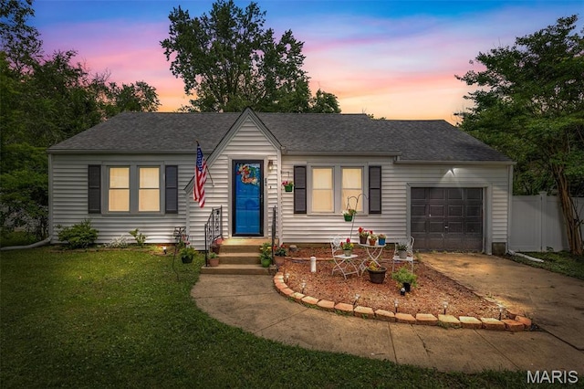 39 Pine St, Farmington, MO 63640 - view of front facade with an attached garage, driveway, and a shingled roof