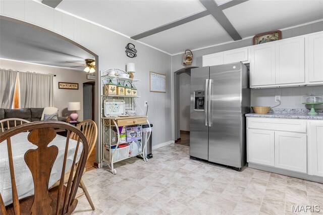 39 Pine St, Farmington, MO 63640 - kitchen with stainless steel refrigerator with ice dispenser, ceiling fan, white cabinetry, and open floor plan