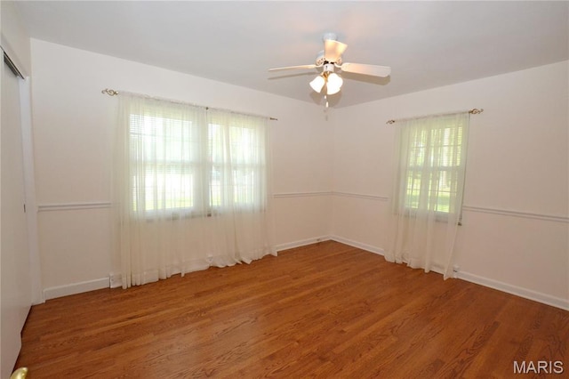 1406 Marshall Rd, Kirkwood, MO 63122 - unfurnished room featuring wood finished floors and a ceiling fan