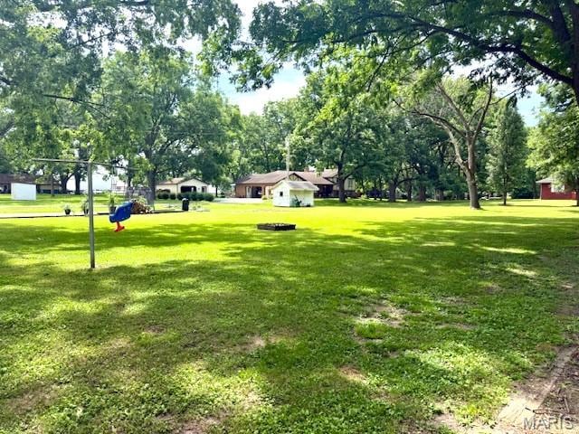 902 Sycamore St, Germantown, IL 62245 - view of grassy yard with view of wooded area