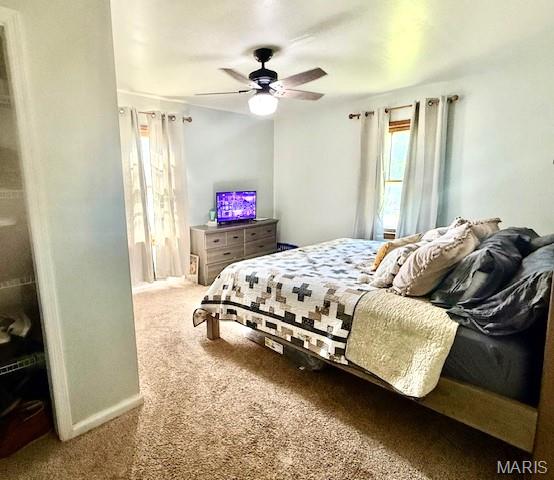 902 Sycamore St, Germantown, IL 62245 - bedroom with carpet flooring and ceiling fan