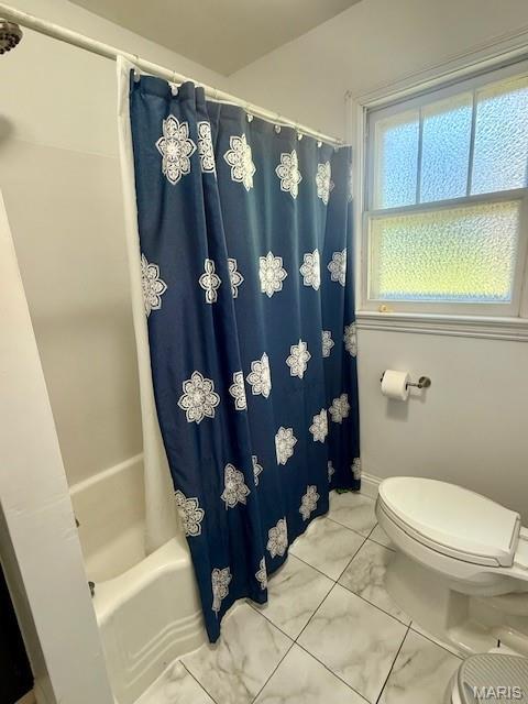 902 Sycamore St, Germantown, IL 62245 - bathroom featuring marble look tile flooring and shower / bath combo