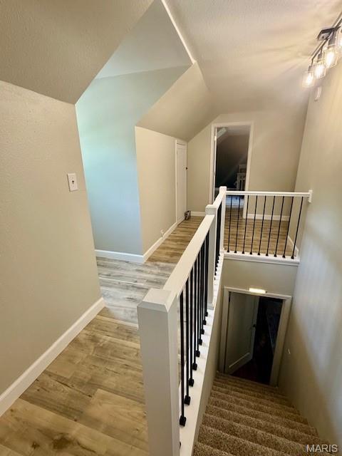 902 Sycamore St, Germantown, IL 62245 - stairway featuring vaulted ceiling and wood finished floors