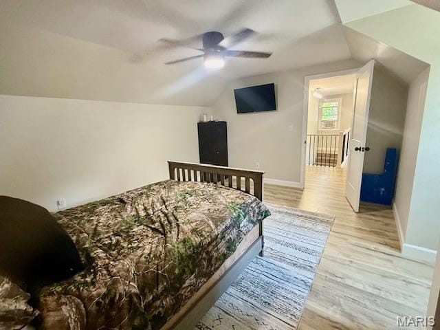 902 Sycamore St, Germantown, IL 62245 - bedroom featuring lofted ceiling, light wood-style flooring, and a ceiling fan