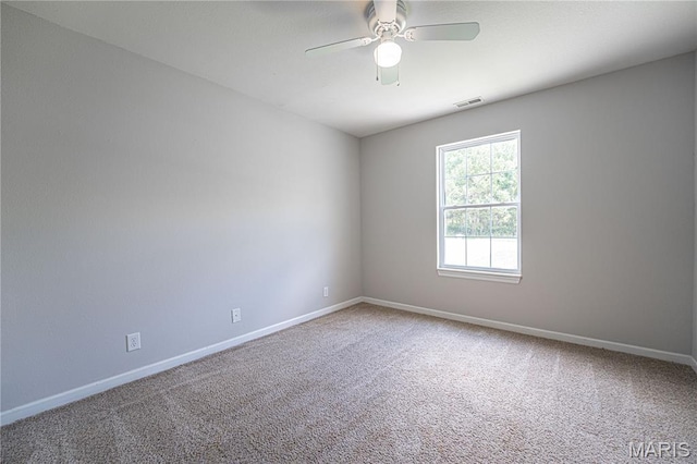 1221 Napoleon Dr, Bonne Terre, MO 63628 - carpeted empty room with baseboards and a ceiling fan