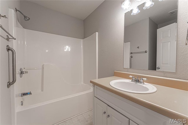 1221 Napoleon Dr, Bonne Terre, MO 63628 - full bathroom with vanity, shower / bath combination, and a textured wall