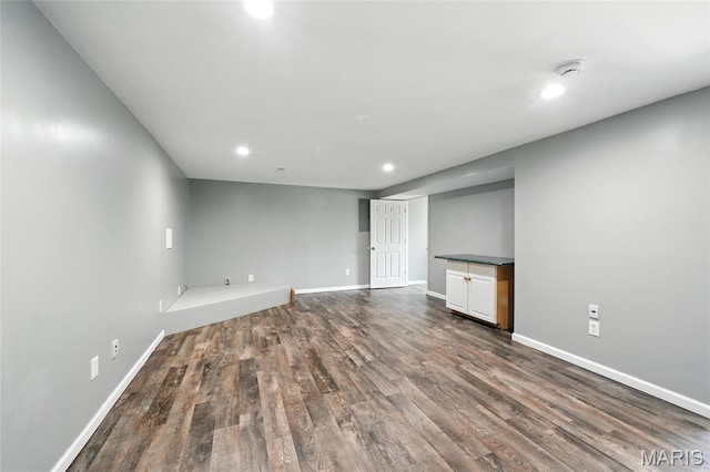 31 Kings Way Dr, Troy, MO 63379 - empty room featuring a smoke detector, recessed lighting, and dark wood-type flooring