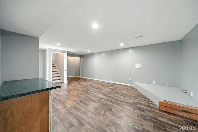 31 Kings Way Dr, Troy, MO 63379 - unfurnished living room featuring stairs, wood finished floors, and recessed lighting