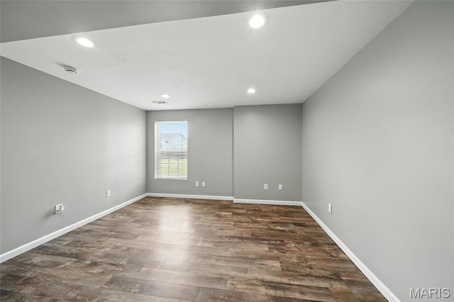 31 Kings Way Dr, Troy, MO 63379 - empty room with dark wood-style floors, recessed lighting, and a smoke detector