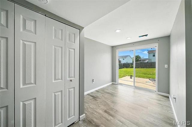 31 Kings Way Dr, Troy, MO 63379 - unfurnished bedroom featuring access to outside, light wood finished floors, a closet, and recessed lighting