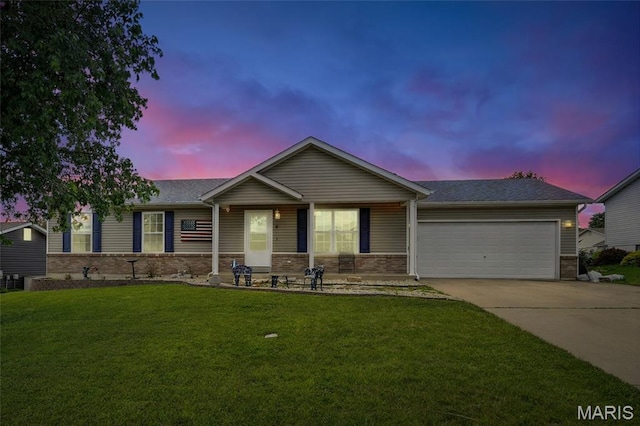 31 Kings Way Dr, Troy, MO 63379 - ranch-style house with brick siding, an attached garage, and a front yard
