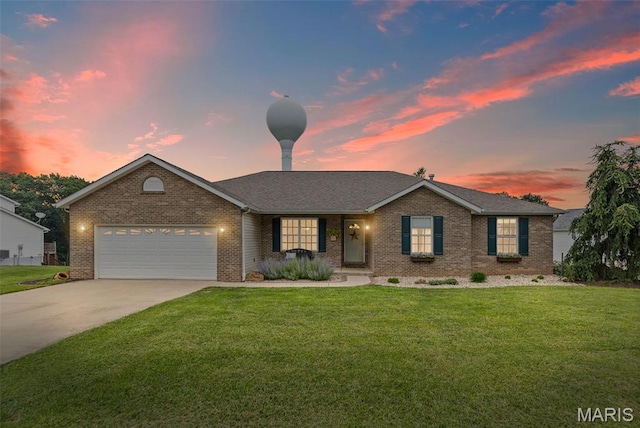 227 W Woodland Rdg, Valmeyer, IL 62295 - single story home with brick siding, a front lawn, an attached garage, and concrete driveway