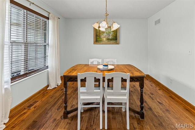 227 W Woodland Rdg, Valmeyer, IL 62295 - dining room featuring a chandelier, hardwood / wood-style floors, and healthy amount of natural light