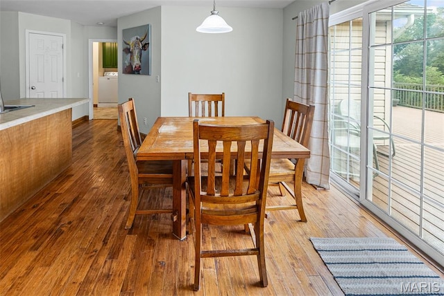 227 W Woodland Rdg, Valmeyer, IL 62295 - dining space with washer / dryer and light wood-style flooring