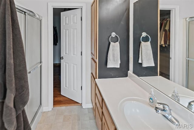 227 W Woodland Rdg, Valmeyer, IL 62295 - bathroom with a stall shower, vanity, and a spacious closet