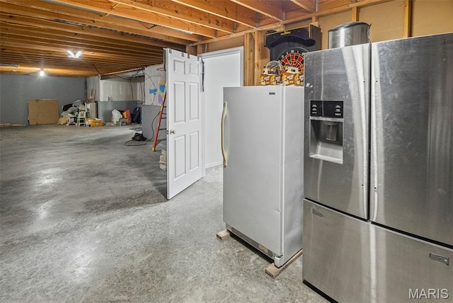 227 W Woodland Rdg, Valmeyer, IL 62295 - unfinished basement with stainless steel refrigerator with ice dispenser and freestanding refrigerator