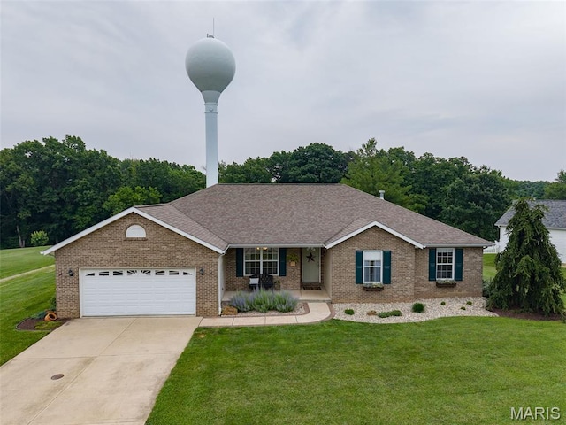 227 W Woodland Rdg, Valmeyer, IL 62295 - single story home featuring a front yard, brick siding, driveway, and covered porch