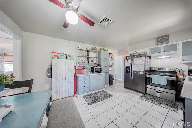 532 Christine St, St James, MO 65559 - kitchen with appliances with stainless steel finishes, under cabinet range hood, ceiling fan, and light countertops