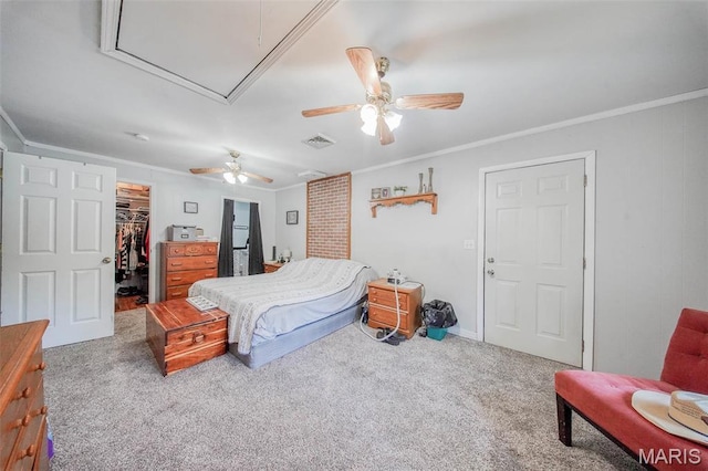 532 Christine St, St James, MO 65559 - carpeted bedroom with attic access, a walk in closet, crown molding, and a ceiling fan