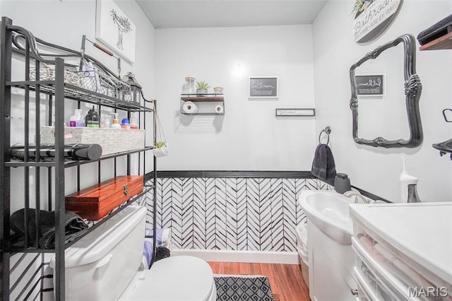 532 Christine St, St James, MO 65559 - bathroom with a wainscoted wall, wood finished floors, and vanity