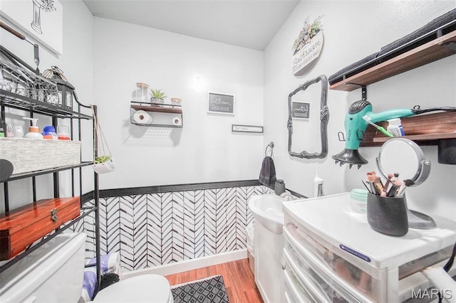532 Christine St, St James, MO 65559 - bathroom with wood finished floors and wainscoting