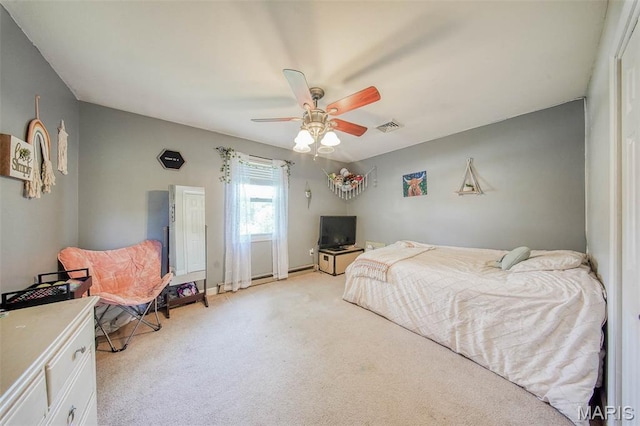 532 Christine St, St James, MO 65559 - bedroom with light colored carpet and ceiling fan