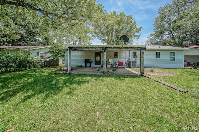 532 Christine St, St James, MO 65559 - rear view of property with a patio and a lawn