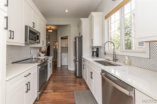 2514 S Larksong Dr, Grover, MO 63040 - kitchen featuring appliances with stainless steel finishes, light countertops, tasteful backsplash, and recessed lighting