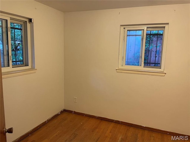 2010-12 E Desoto Ave, Saint Louis, MO 63107 - empty room featuring wood finished floors