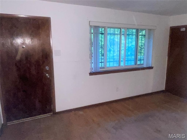 2010-12 E Desoto Ave, Saint Louis, MO 63107 - empty room with baseboards