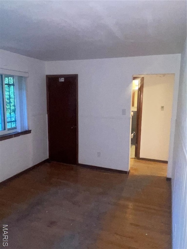 2010-12 E Desoto Ave, Saint Louis, MO 63107 - unfurnished room with wood finished floors