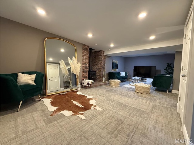 10755 Kennerly Rd, Sunset Hills, MO 63128 - carpeted living area featuring recessed lighting and a wood stove