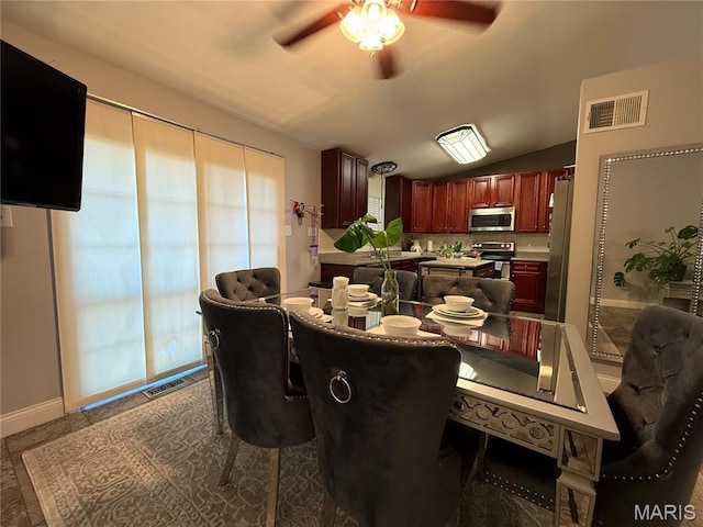 10755 Kennerly Rd, Sunset Hills, MO 63128 - dining area with a ceiling fan and lofted ceiling