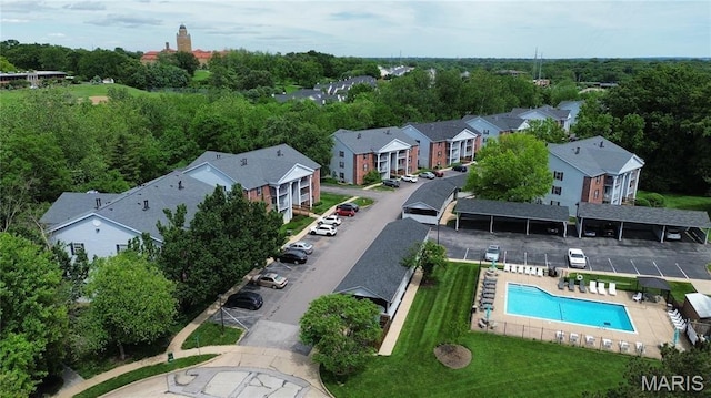 7519 Triwoods Dr Unit J, Shrewsbury, MO 63119 - aerial perspective of suburban area with a pool