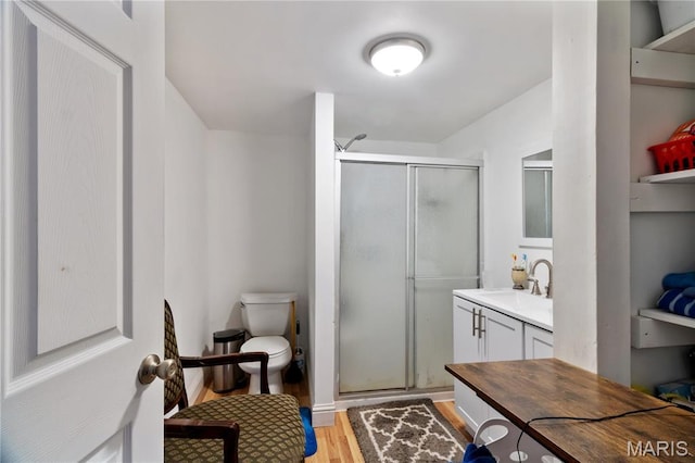 407 N 11th St, De Soto, MO 63020 - full bath with wood finished floors, a stall shower, and vanity