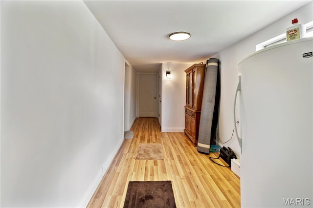 407 N 11th St, De Soto, MO 63020 - hall featuring light wood finished floors and baseboards