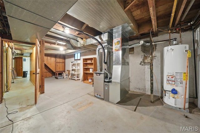 8609 Engler Ave, Saint Louis, MO 63114 - unfinished basement featuring water heater and heating unit