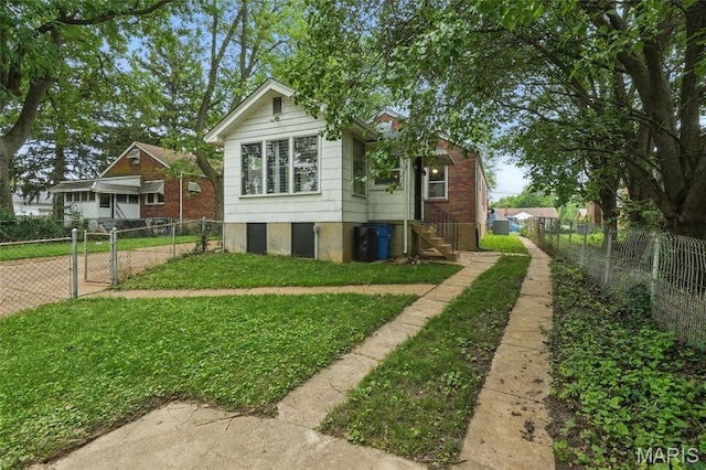 8609 Engler Ave, Saint Louis, MO 63114 - view of property exterior with a gate and entry steps