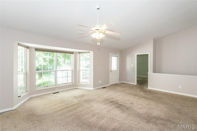 10932 Concord Circle Dr, Concord Village, MO 63123 - carpeted spare room featuring a ceiling fan and vaulted ceiling