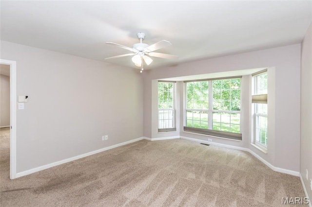 10932 Concord Circle Dr, Concord Village, MO 63123 - spare room with carpet floors and ceiling fan