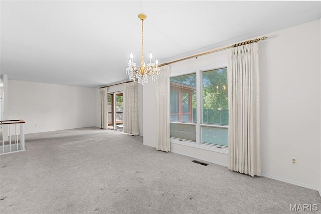 11894 Featherwood Dr, Creve Coeur Township, MO 63146 - carpeted spare room featuring a chandelier and healthy amount of natural light