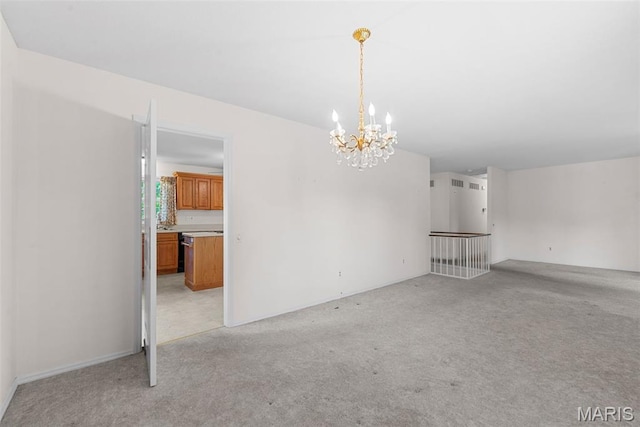 11894 Featherwood Dr, Creve Coeur Township, MO 63146 - unfurnished living room featuring a chandelier and light colored carpet