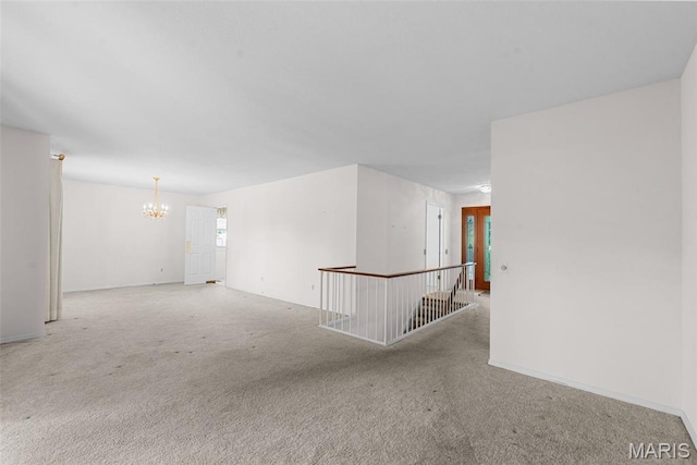 11894 Featherwood Dr, Creve Coeur Township, MO 63146 - carpeted spare room featuring a chandelier and baseboards