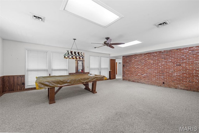 11894 Featherwood Dr, Creve Coeur Township, MO 63146 - recreation room with brick wall, carpet flooring, billiards table, wainscoting, and ceiling fan