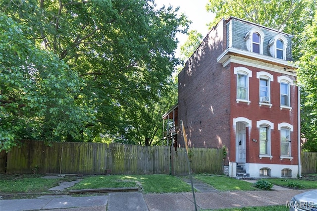1412 Bremen Ave, Saint Louis, MO 63107 - view of front of house featuring brick siding and mansard roof