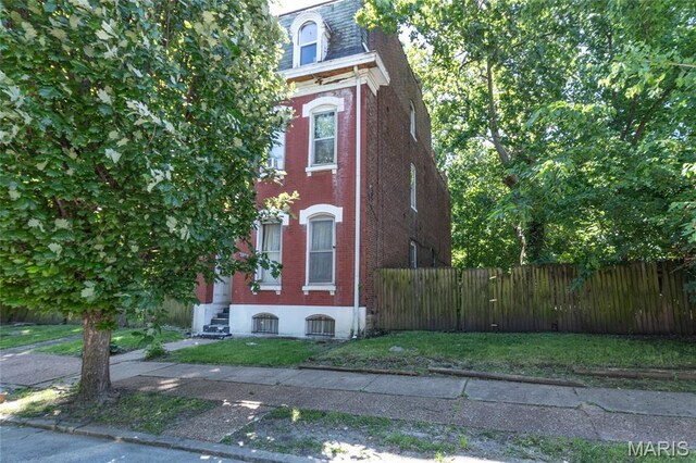 1412 Bremen Ave, Saint Louis, MO 63107 - view of front of property featuring brick siding, entry steps, and mansard roof
