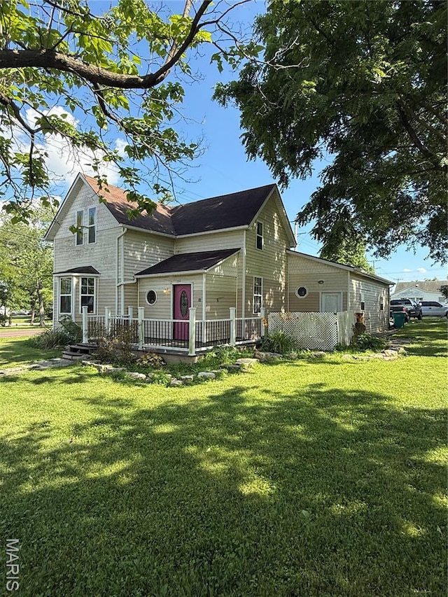 32 E 4th St, Gerald, MO 63037 - back of house featuring a lawn