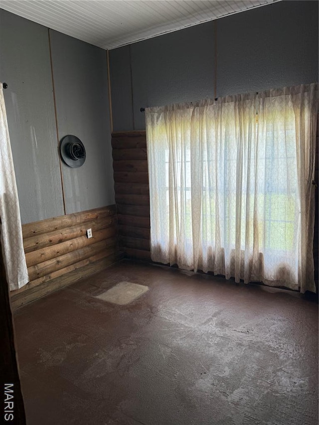 32 E 4th St, Gerald, MO 63037 - unfurnished room featuring rustic walls and carpet flooring
