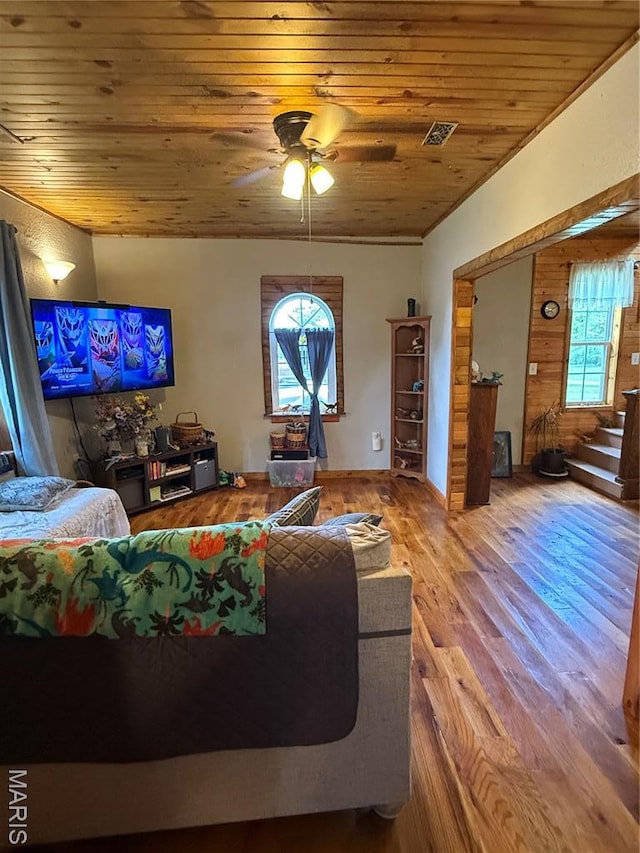 32 E 4th St, Gerald, MO 63037 - living area featuring wooden ceiling, ceiling fan, wood finished floors, and stairway